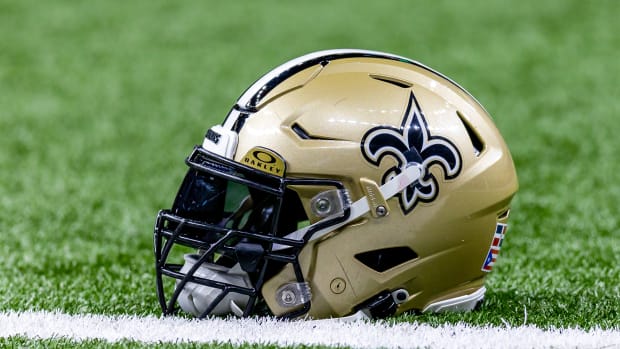 Detailed view of the New Orleans Saints helmet during warmups against the Atlanta Falcons at Caesars Superdome.